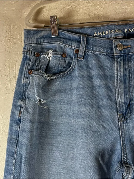 American Eagle Dreamy Drape Low Rise Flare Leg Jeans in Blue - Picture 4 of 14